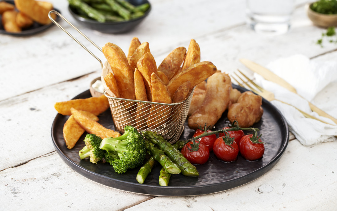 Crispy seasoned wedges skin on