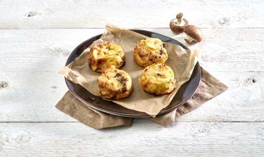 Potato gratin with truffle flavour and mushrooms