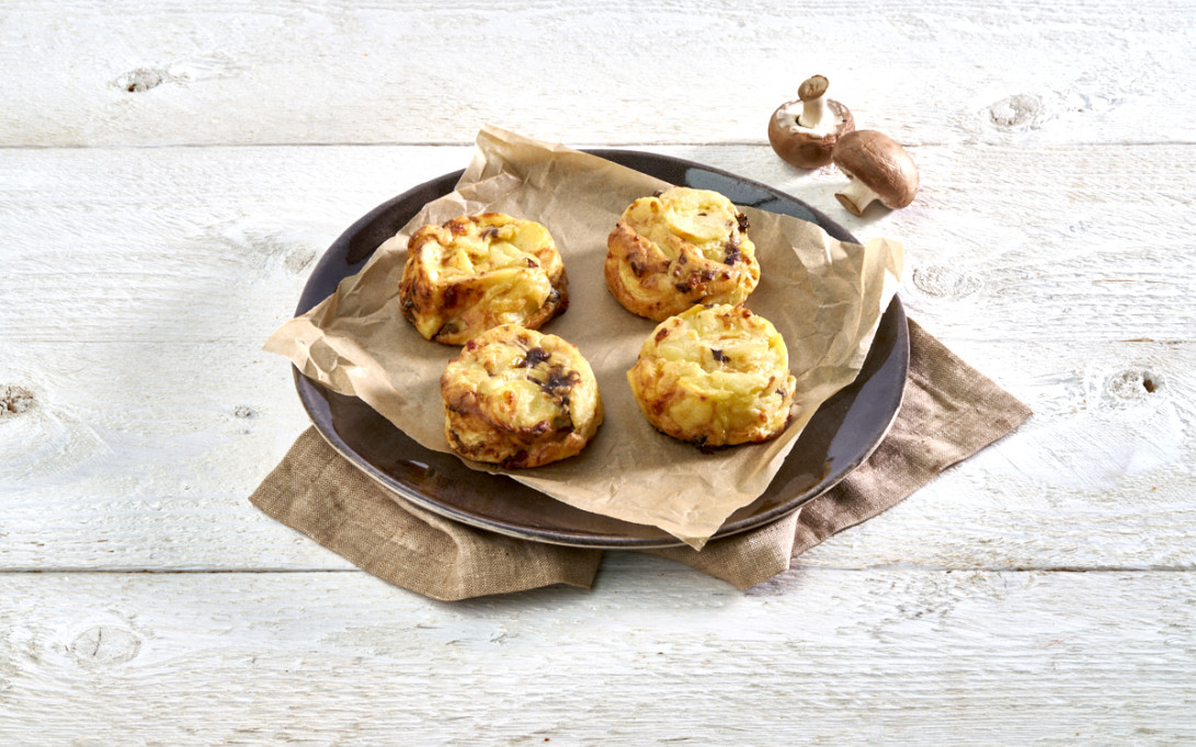 Potato gratin with truffle flavour and mushrooms