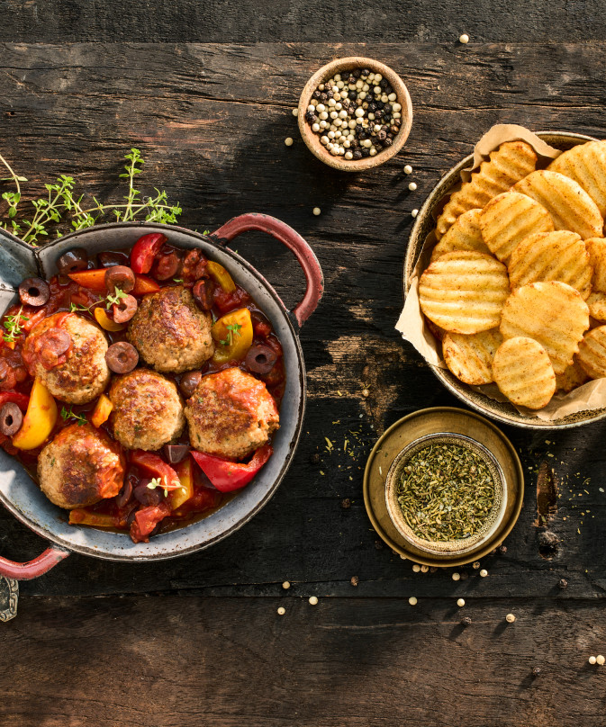 Super crispy deep crinkle slices with a stew of meatballs